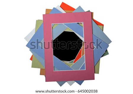 stack of cardboard picture frames on a white background is central dark pink frame cut the center frame