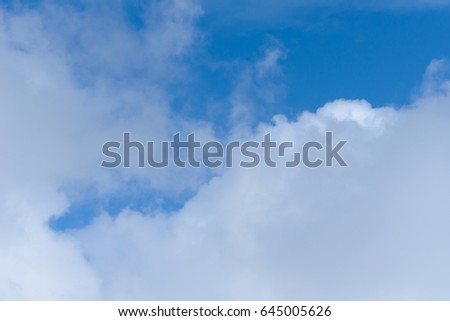 Background of sky with fluffy white clouds.Horizontal.