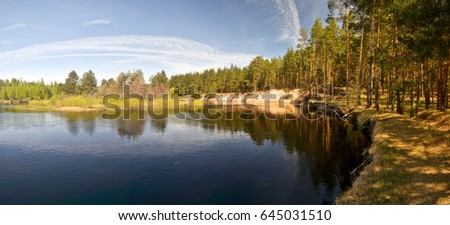 Panorama of the spring river. May water landscape in the national park "Meshchersky" in Russia.