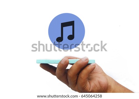 Hand holding smartphone with music icon over white background