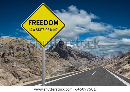 Freedom is a State of Mind highway sign