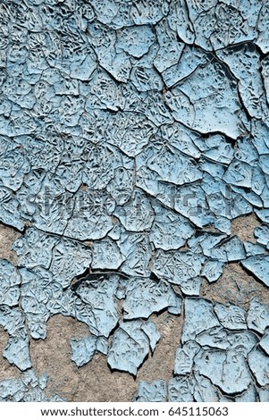Old paint peeling from wall texture background