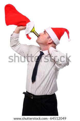Drinking businessman with Santa's cap and stocking. New Year celebration concept.