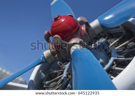 biplane propeller close-up view with the head in focus