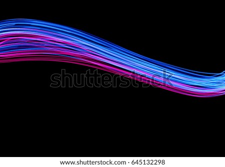 Blue and Pink Light Painting Photography, smooth curve against a black background