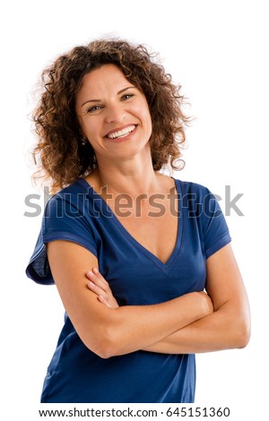 Smiling middle aged woman with arms folded, isolated on white background Royalty-Free Stock Photo #645151360