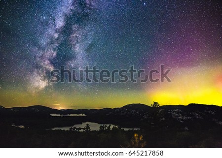  Northern Lights (Aurora Borealis) and the Milky Way Galaxy Above a Mountain Lake in Amazing Colorful Night Sky