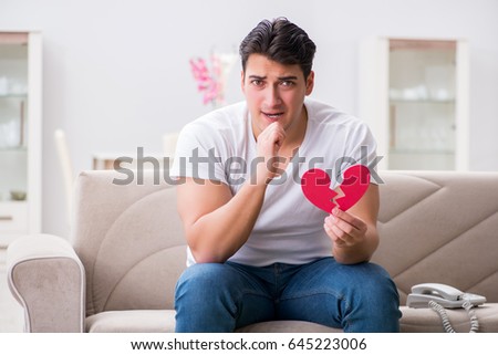 Young man in sad saint valentine concept