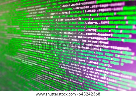 Programming of Internet website. Software abstract background. Writing programming functions on laptop. Binary digits code editing. Web site codes on computer monitor. Notebook closeup photo. 
