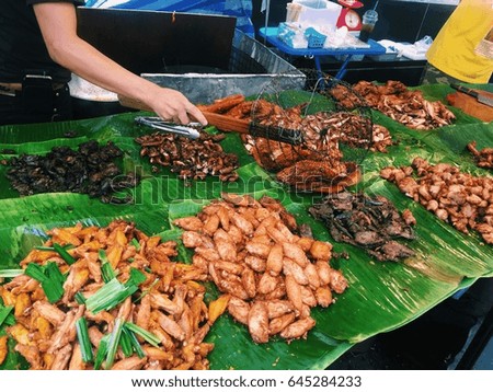 street food Thailand. traditional food stalls market. food on banana leaf.