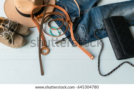 Accessories costume clothes Jeans and hats sunglasses shoes on a white background.