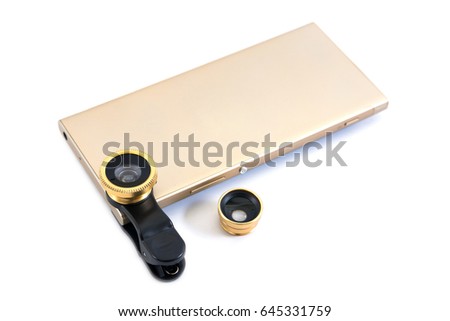 Gold smartphone with lens isolated on white background.Golden mobile phone with lenses and clip isolated
