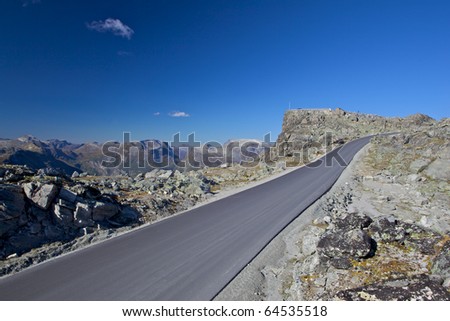 Mountian new asphalt road on the blue sky background (picture taken using a polarizing filter)