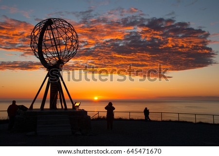 Nordkapp. Globe Monument at North Cape, Norway. Midnight at Nordkapp Royalty-Free Stock Photo #645471670