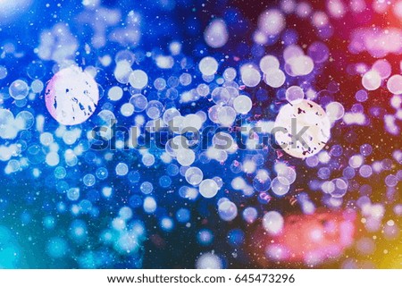 abstract blurred of blue and silver glittering shine bulbs lights background