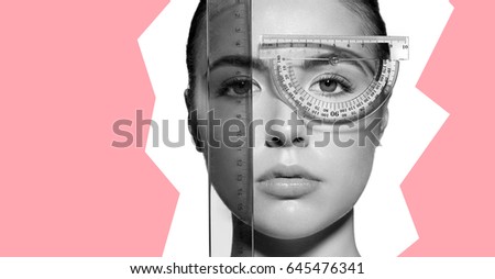 Close-up of a woman's face measure rulers before a plastic surgery to change the proportions. Isolated on white background