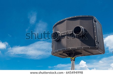 Loudspeaker Split on the sky background