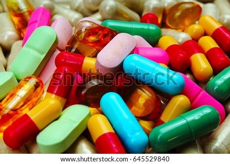 Medical or vitamin pills. Colorful medicine pills as texture. Pill pattern background.

