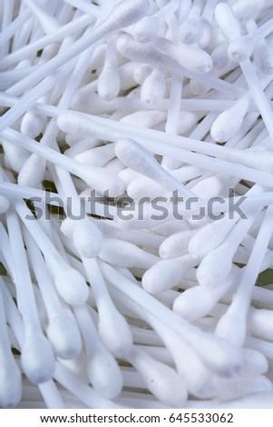 Cotton swabs ear cleaning or cosmetic tool as background texture pattern. Cotton swab background.