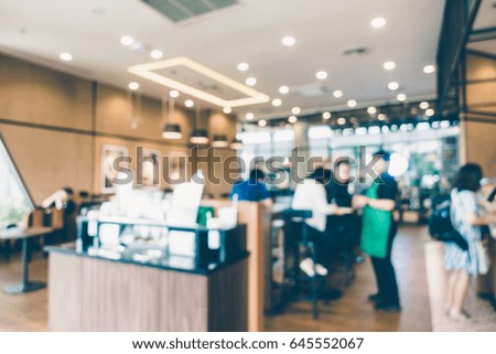 Abstract blur and defocused coffee shop cafe and restaurant interior for background - Vintage Filter