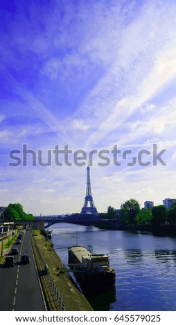 Eiffel Tower in the day in Paris, France.