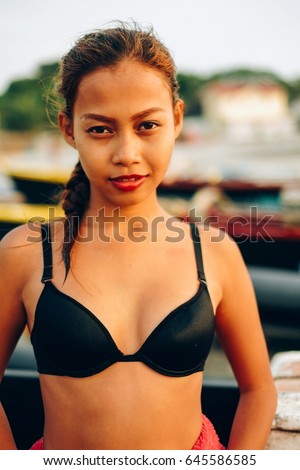 Beautiful native Asian girl on the beach, Girl during the summer on the local beach island
