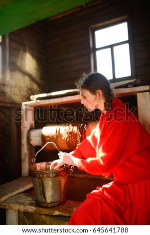 Beautiful young girl in red, rustic style