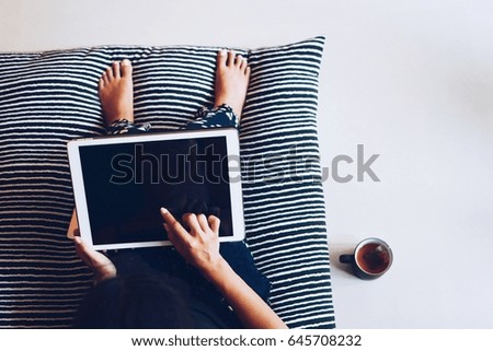 Woman using tablet,top view 