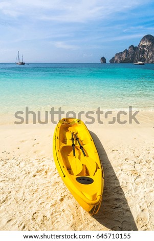 Amazing view of beautiful beach with kayak on the sand. Location: Phi Phi Island, Krabi province, Thailand, Andaman Sea. Artistic picture. Beauty world.