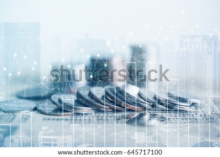 Double exposure of coins and city background for finance and banking concept