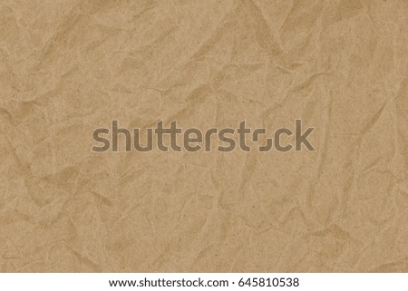 Close-up old crumpled brown wrinkled paper texture background, Craft paper for eco world.
