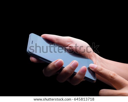 human hands holding a smartphone in many action on black background, with clipping path