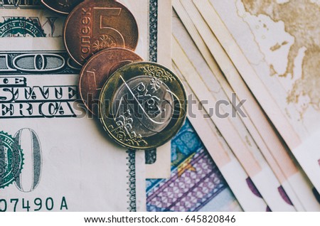 Dollars and euro banknotes on the table