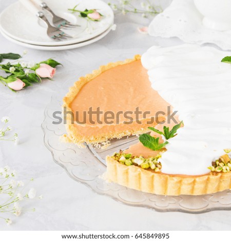 Grapefruit tart pie curd mint marble table glass plate