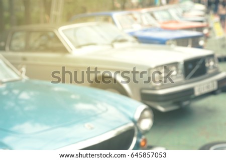Defocused photo of retro car show