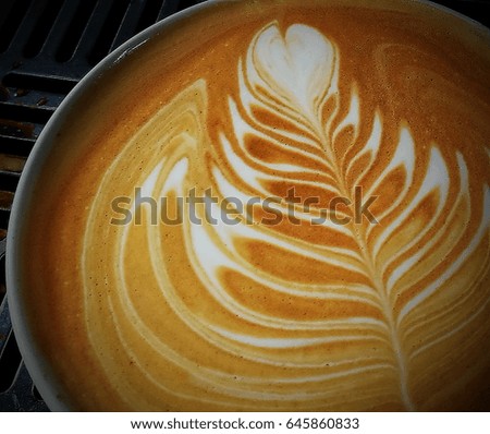 Latte art rosetta pattern, coffee shop at Bangkok  , Thailand
