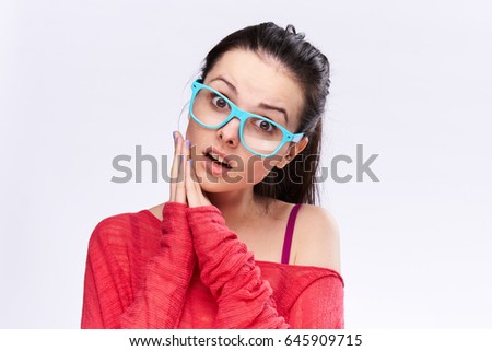 Woman in glasses in red                               