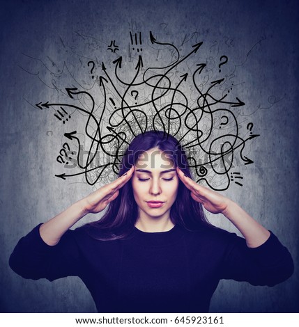 Stressed woman has too many thoughts Royalty-Free Stock Photo #645923161