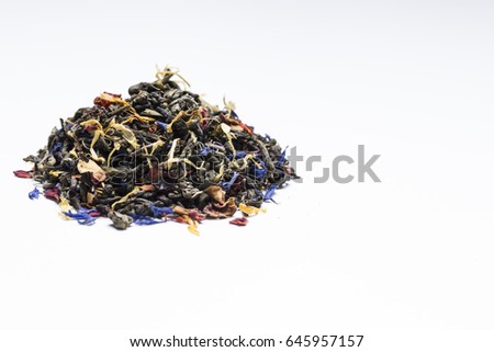Heap of dry green tea on white background. Copy space for any information.