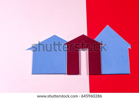 House on bright colorful background. Home construction concept . Copy space for text.