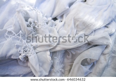 Crinkled white textured textiles