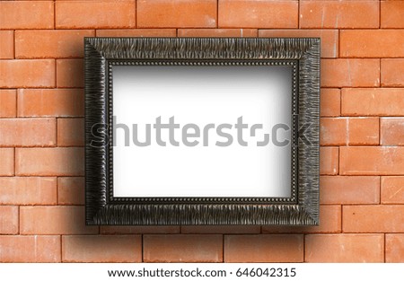 Vintage picture frame on red brick background us for display something you want