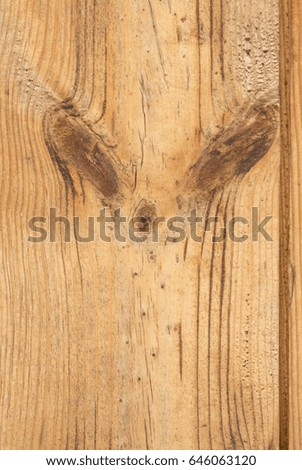 Funny face on wooden board