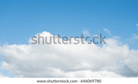 white clouds on a blue sky day