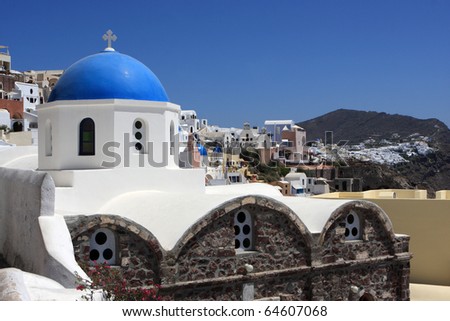 It is church with blue dome in oia, santorini