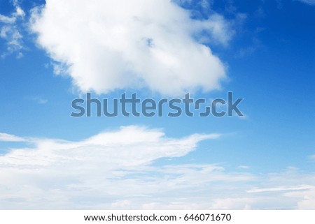  White clouds in the blue sky.