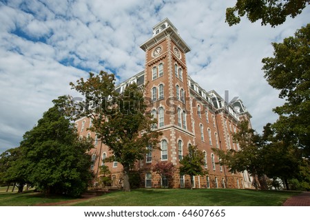 The Old Main clock tower - oldest building on the University of Arkansas campus Royalty-Free Stock Photo #64607665