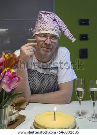 The man in the funny hat celebrates his birthday