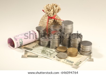 currency notes and coins, growth in money Royalty-Free Stock Photo #646094764