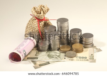 currency notes and coins, growth in money Royalty-Free Stock Photo #646094785